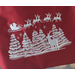 Red with a winter scene of six snow-covered Christmas trees, with blue ornaments. Above trees is Santa and his sleigh, pulled by 8 reindeer